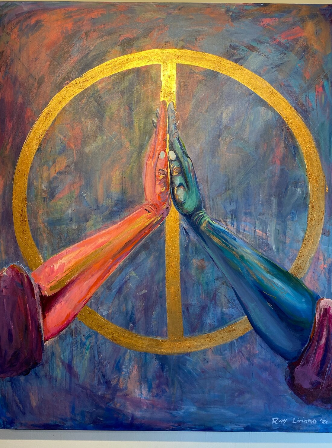 Painting of two hands meeting at a golden peace sign